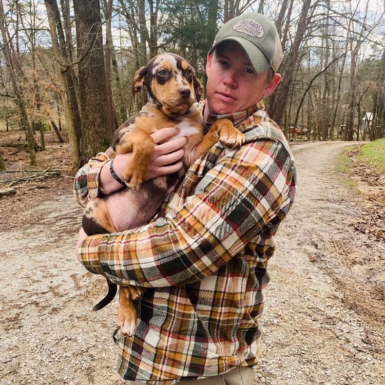 Dog and trainer working together in Augusta, GA to improve behavior and obedience.